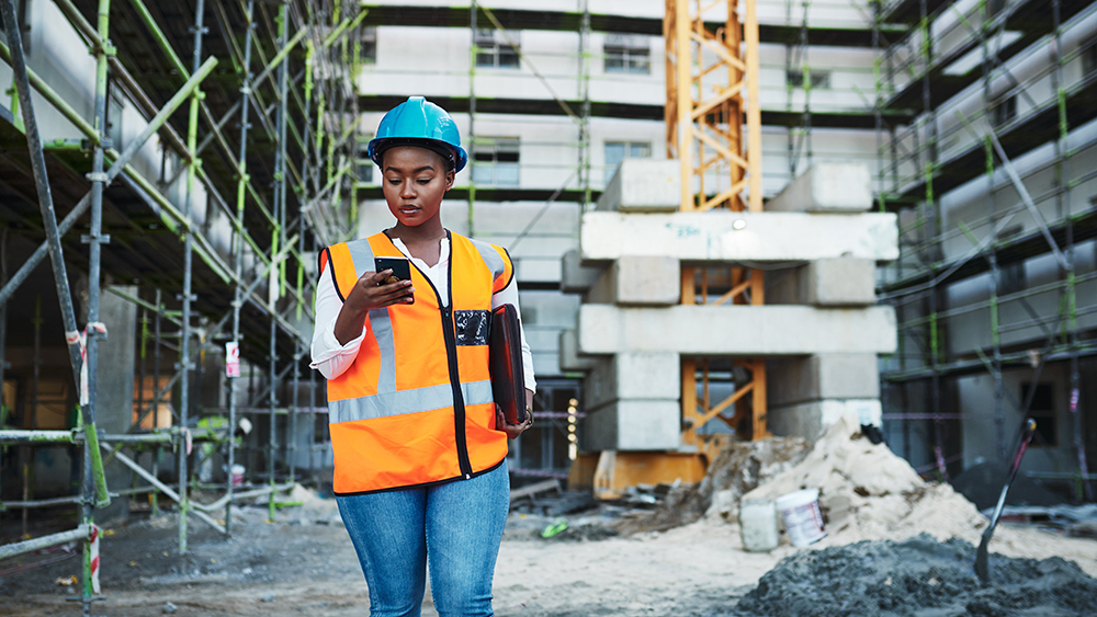 647888ca92d03e3fca3f2456 shot of a young woman using a smartphone while wor 2022 10 07 21 20 41 utc