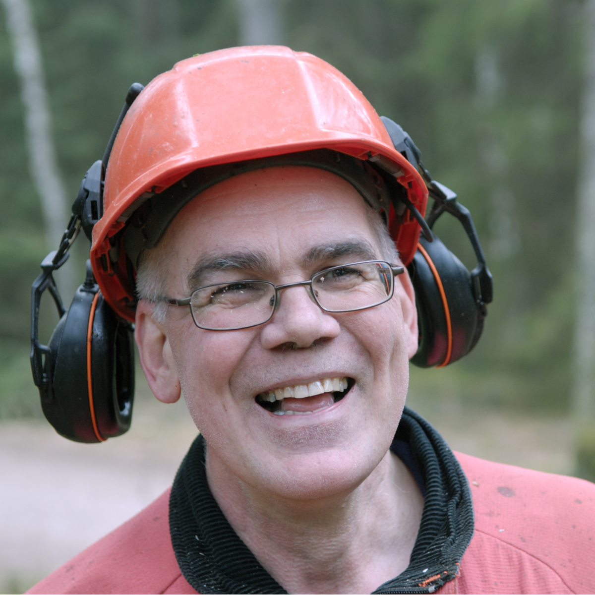 Injury Prevention Within the Logging Industry 4 man with a hard hat and ear protection